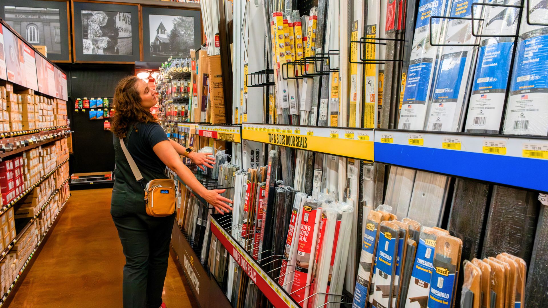 woman frolicking in homco weather stripping aisle 
